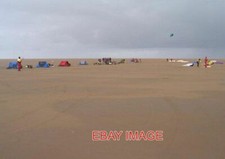 PHOTO  PARAKARTERS HAVING A