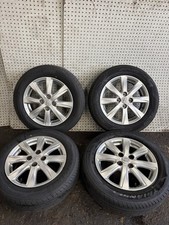 TOYOTA YARIS 15" INCH 8 SPOKE ALLOY WHEELS & TYRES SILVER 42611-0D610