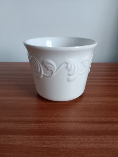 White ceramic planter features - white,