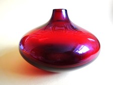 Lovely ruby coloured onion shaped signed bud vase in very nice condition.