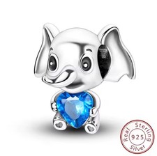 Baby Elephant Holding Blue