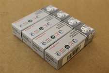 Set of four spark plugs for