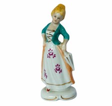 Antique porcelain figurine