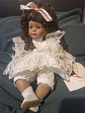 BLACK PORCELAIN DOLL, 12ins