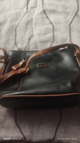 The black shoulder - bag, with