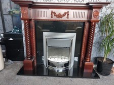 Ornate fire surround and Black