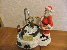 Musical ornament of santa washing rudolph in a tub 20 cm tall 1.760kg with box