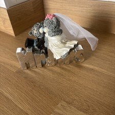 You bear figurine - to,