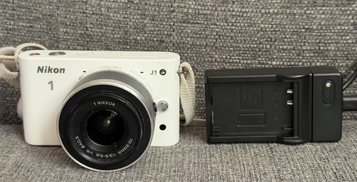 White nikon mirrorless - 1, j1
