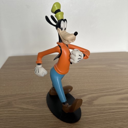 Disney goofy walking statue - disney,