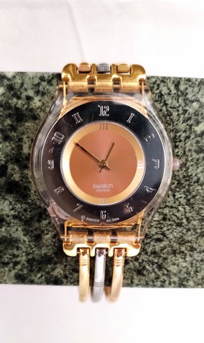 Swatch watch skin tri - tri, gold