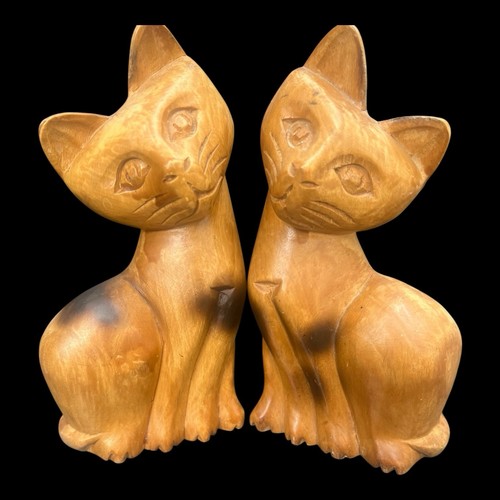 Hand carved wooden kittens - hand,