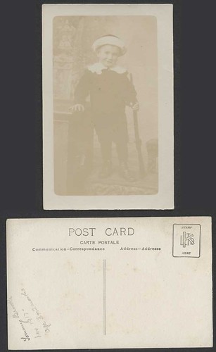 Boy with toy - gun, tommy