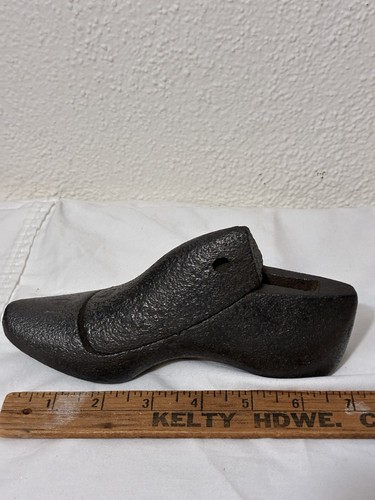 Vintage cast cobblers shoes - cast,