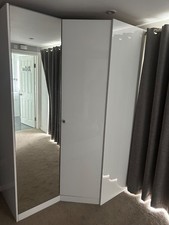 white corner wardrobe with