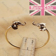 Retro ELEPHANT HEAD animal BANGLE bracelet GOLD TONE FASHION metal QUIRKY torque