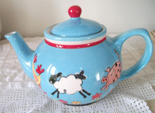 FUN LARGE BLUE TEA POT SHOWING