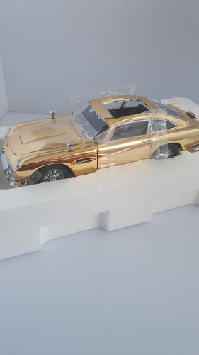 Danbury mint aston - danbury, gold