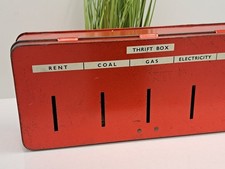 Vintage Red Metal Thrift Money Box with slots for old pennies and half crowns