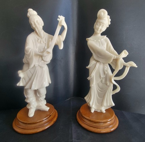 Pair faux chinese - chinese, ivory