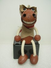 Novelty Ornament In The Form Of A Sitting Horse Dressed As A Cowboy