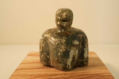 Hand carved stone seated - hand,