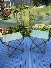Retro pair of folding camping chairs with metal frame and green material