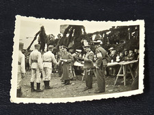 WEHRMACHT OFFICERS GIVE MEDALS