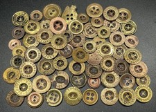 Lot of Victorian buttons . Found in the river Thames in London .