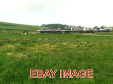 PHOTO  WRAPPING SILAGE BALES
