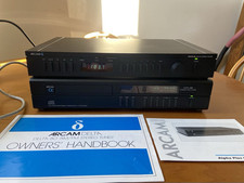 An Arcam Alpha Plus CD Player & Arcam Delta 80 AM/FM Stereo Tuner With Manuals