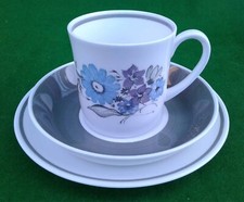 SUSIE COOPER - BLUE & PURPLE FLOWERS - TEA CUP, SAUCER AND SIDE PLATE TRIO.
