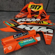 Plastics + Graphics applied