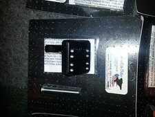 Side mount bracket for Harley