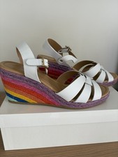Russell and Bromley White