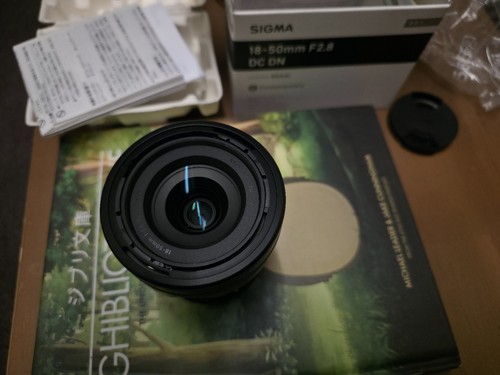 Sigma 50mm dc dn - sigma, f/2.8