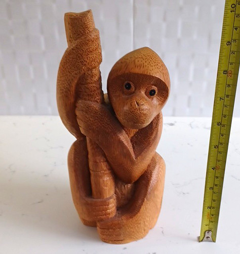 Hand carved wooden monkey - hand,