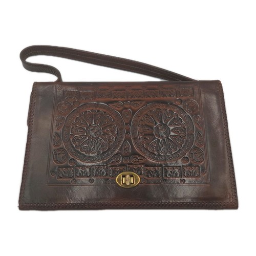 Artisan tooled leather - tooled,