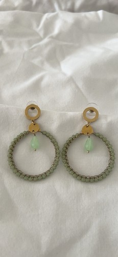 Hoop earrings feature pale - earrings,