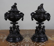 Pair of French Bronzed Spelter Urns with Bacchic Masks and Putti, Circa 1880