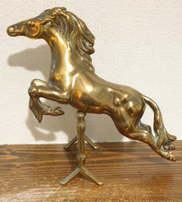 Vintage Solid Brass Horse Figurine Jumping Over a Fence in a Dynamic Pose.
