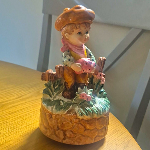 Ceramic boy figurine holding - ceramic,