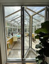 White bi-folding doors internal doors. Excellent condition. Double glazed.