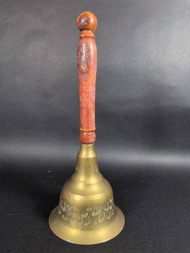 Vintage hand held bell - hand,