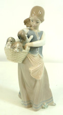 Lladro “Little Dogs on