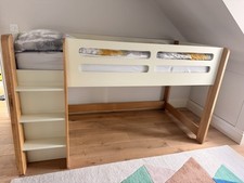 Feather and Black Archie Cabin