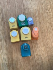 Set Of 7 Paper Punches With Various Designs And Sizes.