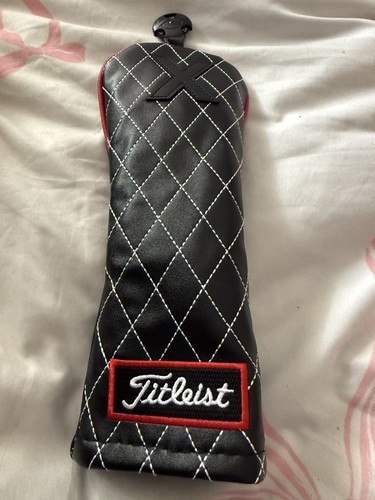 Black and red titleist hybrid - and,