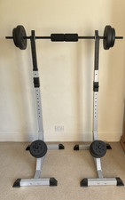 Heavy duty weight stand with barbell, dumbbells and weights. Real bargain