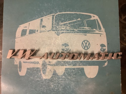 Automatic rear badge emblem - vw,